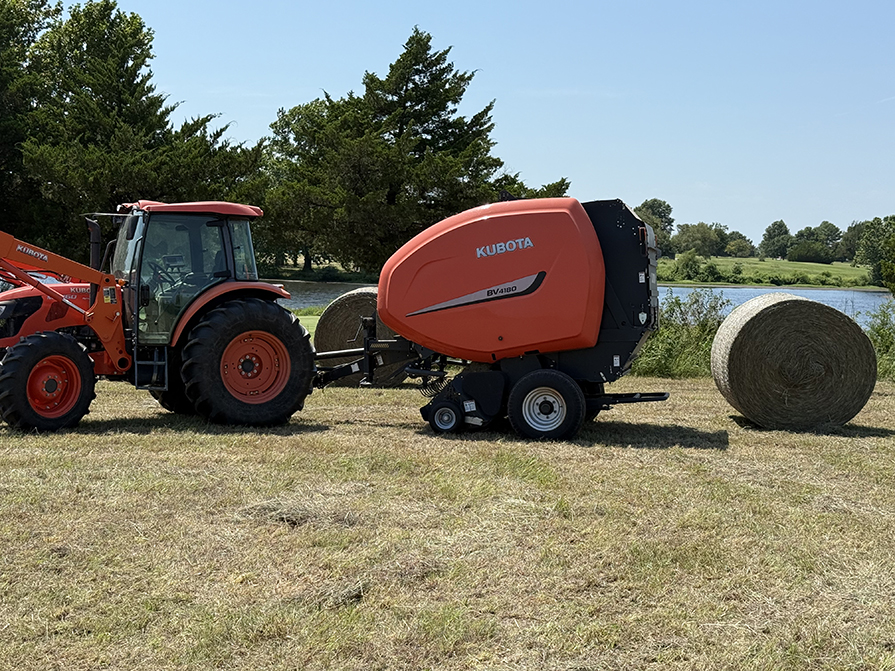 Tractor and Baler with hay bales